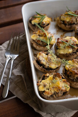 Baked mushrooms with cheese and meat. Low-carb diet.