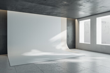 Perspective view on blank white backdrop in photo studio with windows, dark ceiling, wall and...