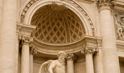 Rome. Trevi Fountain. Close up of Neptune statue, and the beautiful exedra behind him.