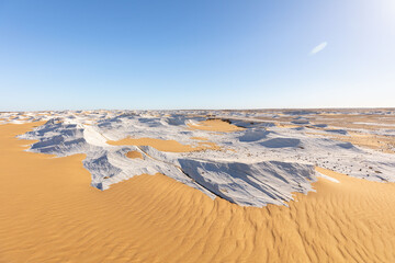 Sunny White Desert with a cloudless blue sky.