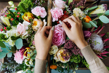 Hands Making Flowers Arrangement Bouquet