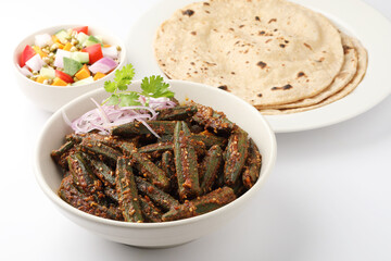 Bharwa Masala Bhindi or Stuffed Okra is an indian main course vegetable recipe made using ladies' fingers or ochro and spices