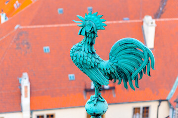 Metal weathercock or weather vane. Metal figure of rooster. Instrument for showing direction of the...