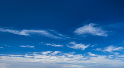 Naklejka na ściany i meble Blue clear sky with clouds