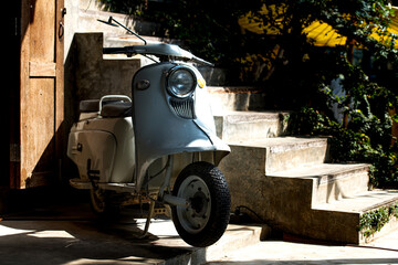 Old motorcycle parked in front of the house Get ready for a trip