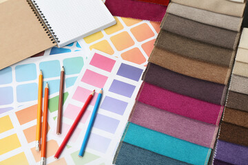 Upholstery fabric samples, pencils and color palette - obrazy, fototapety, plakaty