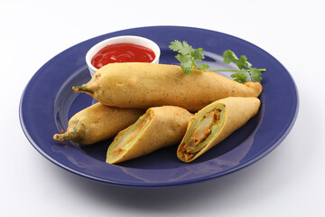 Indian Street Fried Food Spicy Chilli Pakora Served With Sauce & Chutney Also Know as Mirchi Bajji,...