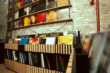 Acrylic prints Music store Rack and shelves with different vinyl records in store