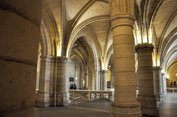Fototapeta premium Interiors of an old church with stained glass windows