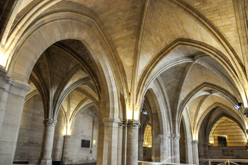 Obraz premium Interiors of an old church with stained glass windows
