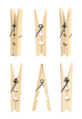 Set with wooden clothespins on white background
