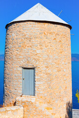 Old Wind mill at Greek Island Hydra at Saronikos Gulf - 439312403