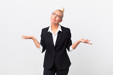 pretty blond woman feeling puzzled and confused and doubting. business concept