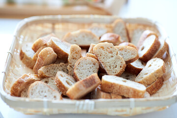 small fresh crisp bread pieces in basket
