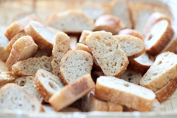 small fresh crisp bread pieces in basket