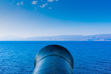 Canon aiming at sea in greek island Hydra in Saronikos Gulf - 439315821