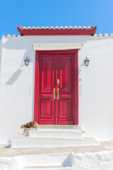 Red wooden door frame in Hydra Island Greece Saronikos Gulf - 439316091