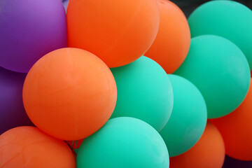 Helium balloons in the office. Colorful festive background for store opening, birthday celebration, corporate party
