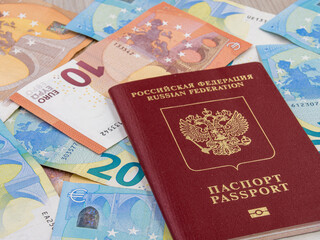 Russian foreign passport and euro banknotes