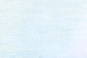 Linen texture background dyed in light blue and white gradient. 