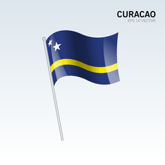 Curacao waving flag isolated on gray background