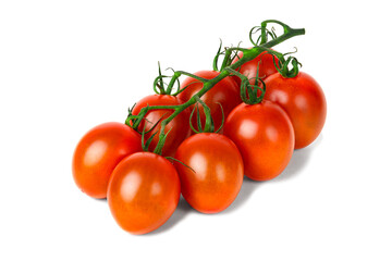 Delicious red cherry tomatoes on a branch. White isolated background