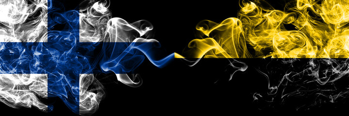 Finland, Finnish vs Germany, Saxony Anhalt smoky flags side by side.