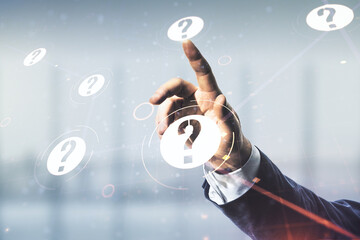 Male hand clicks on abstract virtual question mark sketch on blurred office background, FAQ and...
