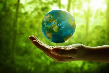 Foto op Canvas Human hand holding planet earth © fotokitas
