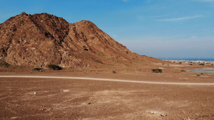 AERIAL. Top view of Road between mountains in UAE