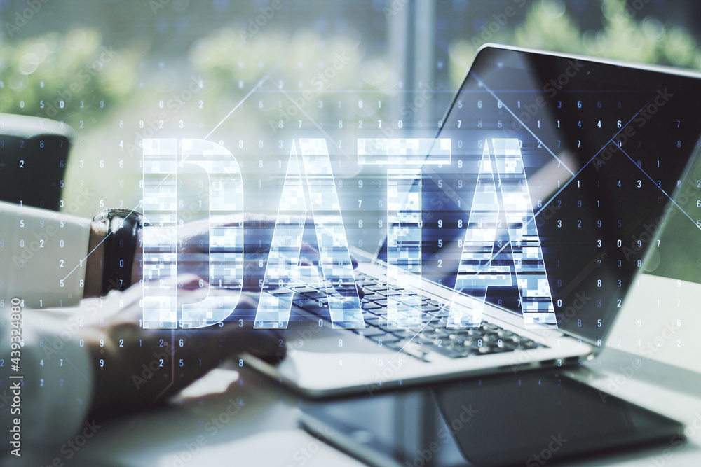 Wall mural creative data word sign and hands typing on laptop on background. multiexposure