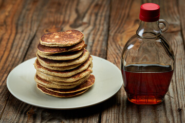 Banana and oat pancakes with maple syrup