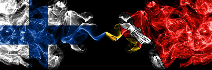 Obraz na płótnie Canvas Finland, Finnish vs Russia, Russian, Voronezh Oblast smoky flags side by side.