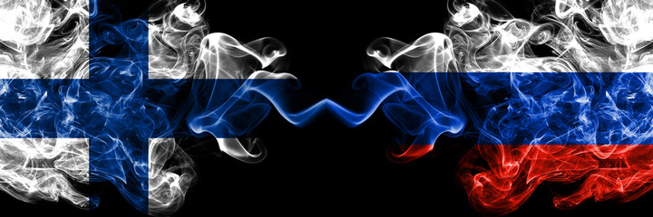 Finland, Finnish vs Russia, Russian smoky flags side by side.