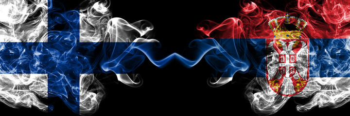 Finland, Finnish vs Serbia, Serbian smoky flags side by side.