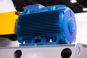 Blue high voltage electric motor. Blue electric engine close-up. Production electric motor. The...