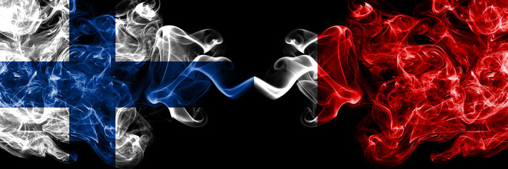 Finland, Finnish vs UAE, United Arab, Emirates, Dubai, Ajman smoky flags side by side.