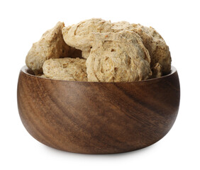 Dehydrated soy meat chunks in bowl on white background
