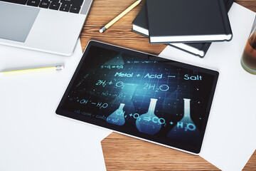 Modern digital tablet monitor with creative chemistry illustration, research and development concept. Top view. 3D Rendering