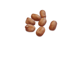 Obraz premium Peanuts peeled from the shell on a white background
