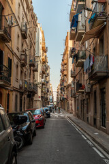 Fototapeta na wymiar Barceloneta neighborhood narrow sreet without people. Barcelona, Spain