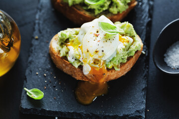 Tasty fresh toast with avocado and egg