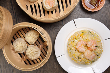 Prawn shrimp shaomai Xiao long bao dim sum dumpling chicken prawn fish seafood vegetable in bamboo...