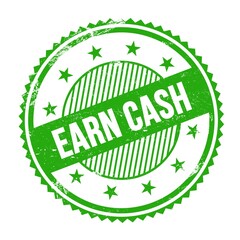 EARN CASH text written on green grungy round stamp.