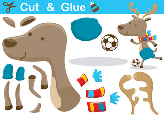 Cartoon of deer wearing scarf while playing soccer at winter. Education paper game for children. Cutout and gluing