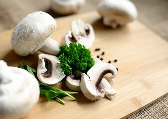mushrooms on a wooden board very tasty!