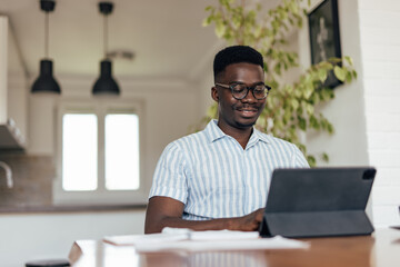 Adult man, consulting with his boss, over the video call.