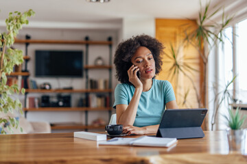 Adult black woman, upgrading her phone package.