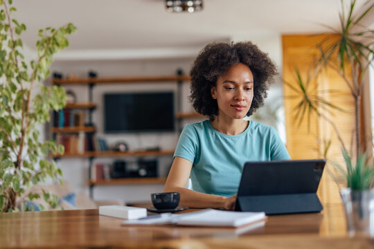 Black Woman, Cleaning Her Messages Folder, At Home Office.