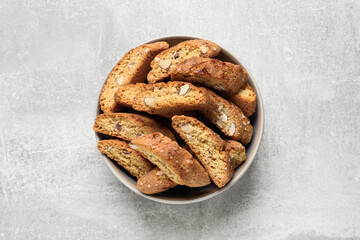 Traditional Italian almond biscuits (Cantucci) on light table, top view